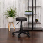 Sgabello medico nero regolabile su ruote con sedile ergonomico sagomato
